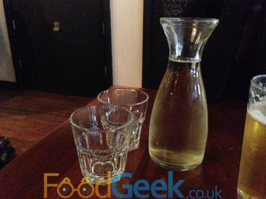 Carafe Of House Wine With School Glasses