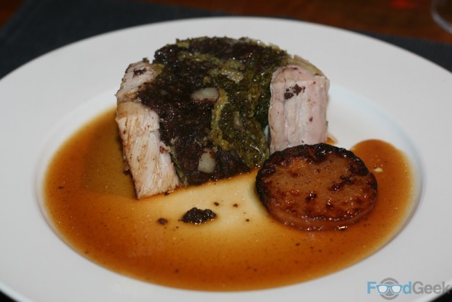 Suckling pig stuffed with black pudding & cabbage